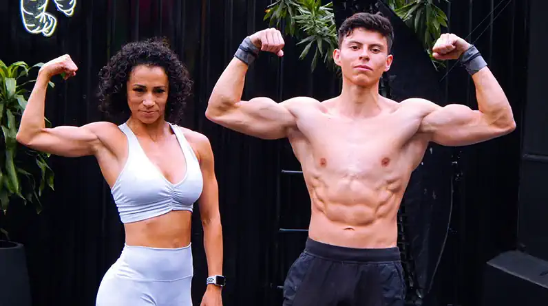 Woman and Man Showing Their 6 Pack Abs